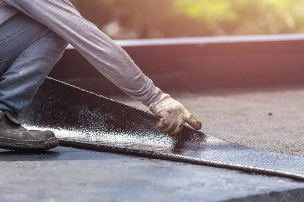 Professional Waterproofing technician working in Olney, MD